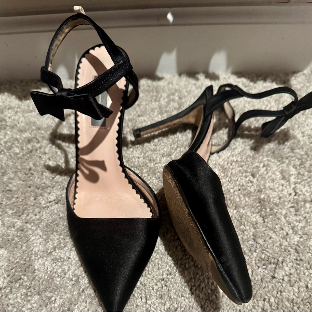 SJP by Sarah Jessica Parker Black Heels with Pointed Toe and Slingback Design
